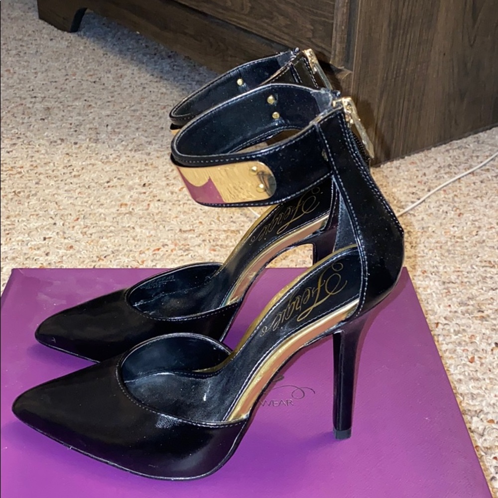 Woman’s Size 6.5 Black with gold strap Fergie Heel